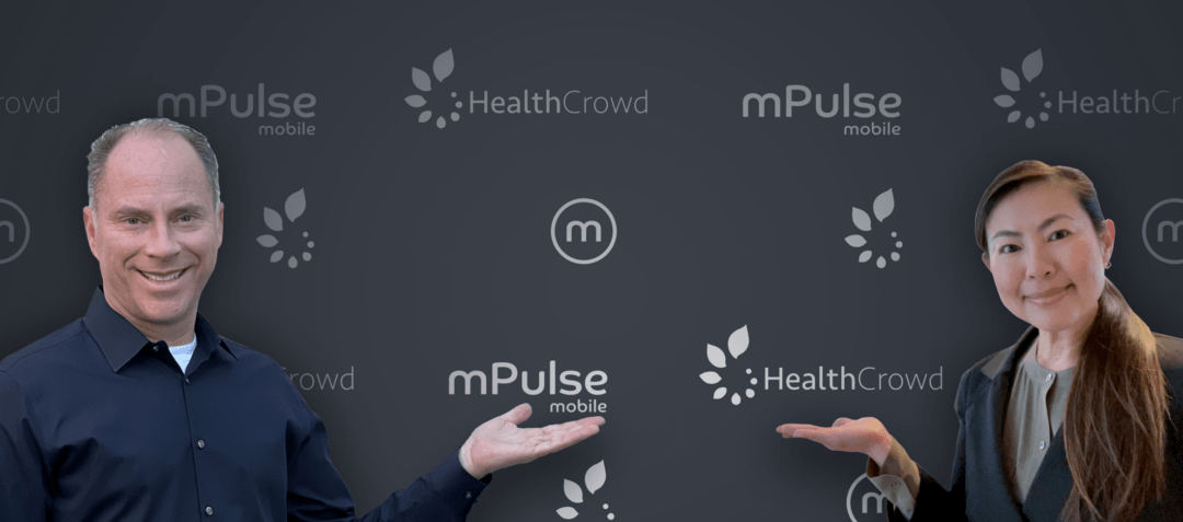 Two professionals gesturing inward in front of a dark branded background