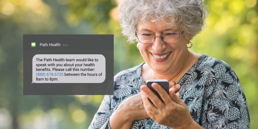 Elderly woman smiling while looking at a smartphone next to a text message overlay from Path Health.