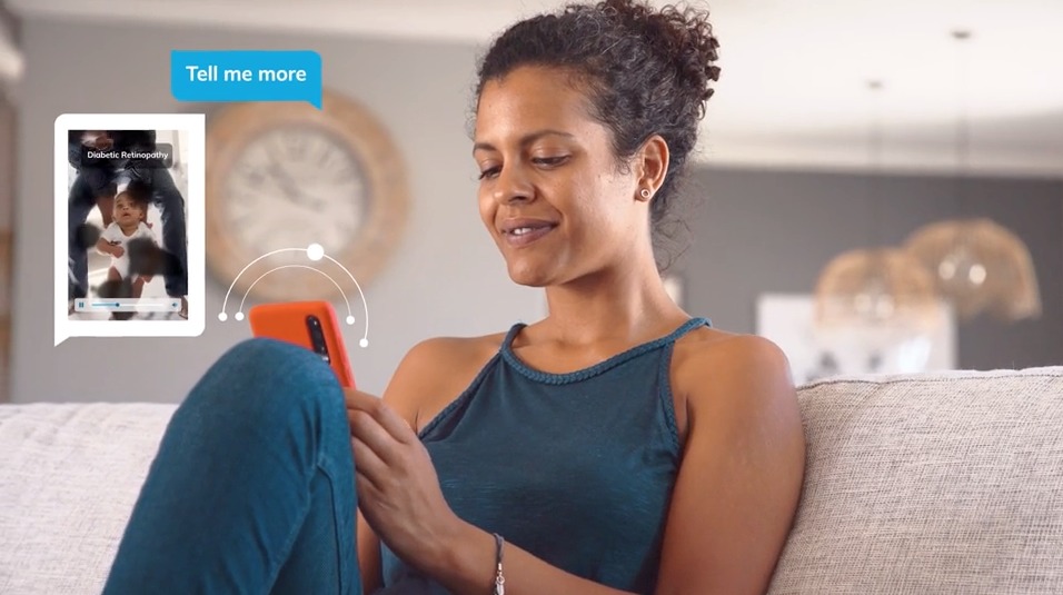 A patient accessing streaming health content on her mobile phone in the convenience of her home